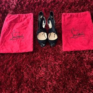 Black Christian Louboutin five inch heels, size 41.5.